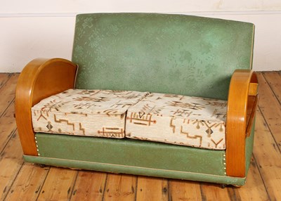 Lot 322 - An Art Deco green upholstered two seater sofa,...