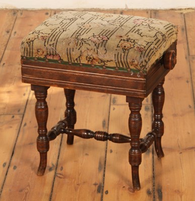 Lot 662 - A late Victorian walnut adjustable piano stool