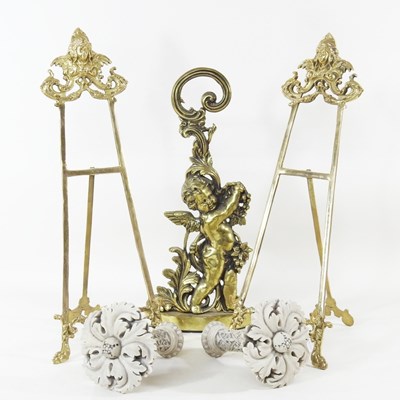 Lot 131 - A pair of ornate brass table easels, together...