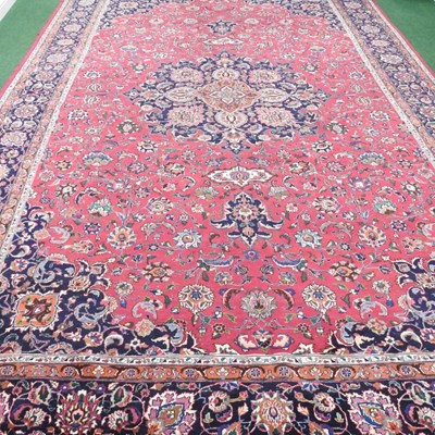 Lot 148 - A large Caucasian carpet, with foliate designs,...