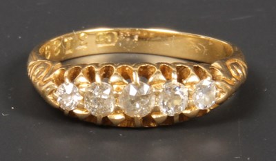 Lot 83 - An 18 carat yellow gold diamond five-stone...