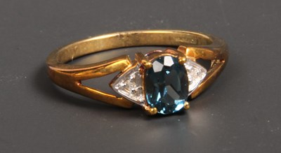 Lot 54 - A 9 carat yellow gold blue topaz and diamond...