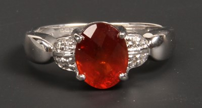 Lot 97 - A 9 carat white gold andesine and diamond ring,...