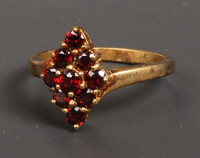 Lot 86 - A 9 carat yellow gold garnet cluster ring,...