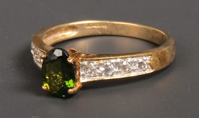 Lot 104 - A 9 carat yellow gold Russian diopside ring,...