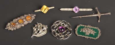 Lot 76 - A collection of seven various silver brooches,...