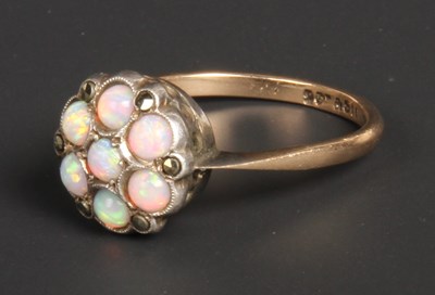 Lot 57 - A 9 carat yellow gold opal cluster ring, size...