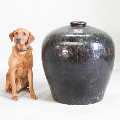 Lot 17 - A large Chinese brown glazed stoneware water...