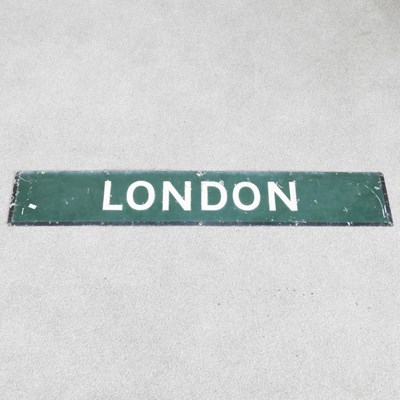 Lot 12 - An enamel sign, London, on a green ground, 112...
