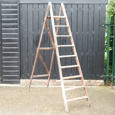 Lot 231 - A set of folding wooden steps, 230cm high