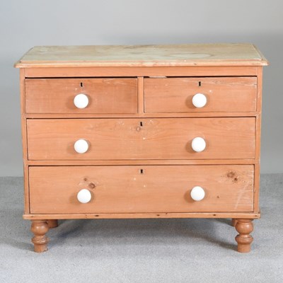 Lot 265 - An antique pine chest, containing three long...