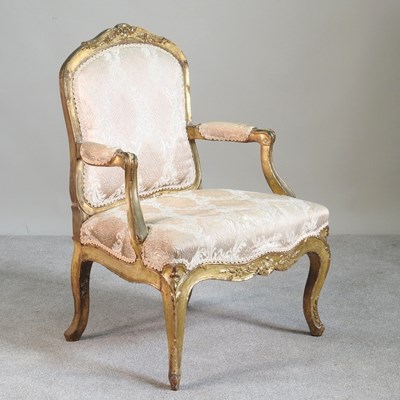 Lot 234 - A Louis XV style gilt framed and cream...