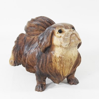 Lot 233 - A black forest style carved model of a...