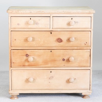 Lot 167 - A Victorian stripped pine chest, on turned feet