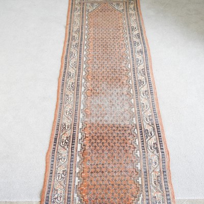 Lot 486 - A Turkish woollen runner, with all over...