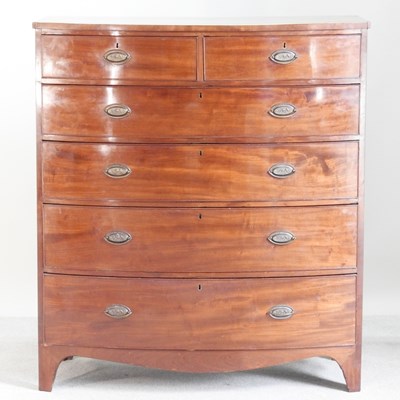 Lot 289 - A large 19th century mahogany bow front chest...