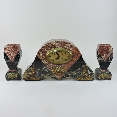 Lot 172 - A French Art Deco coloured marble clock garniture