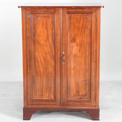 Lot 411 - An Edwardian inlaid cabinet, on bracket feet