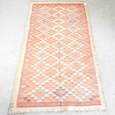 Lot 302 - A Persian kilim rug, with all over diamonds,...