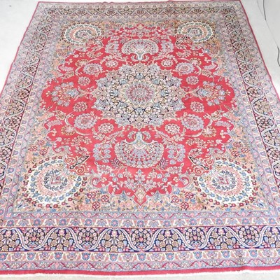 Lot 345 - A Persian kirman carpet, with graduated...