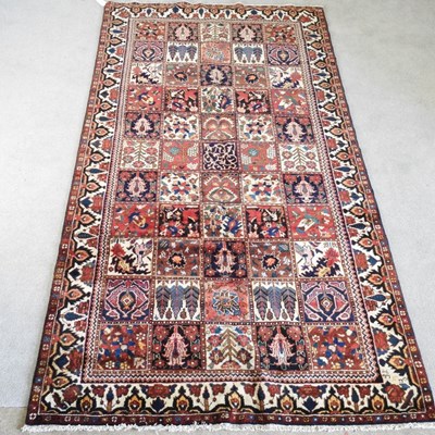Lot 439 - A Persian bakhtiar carpet, with all over...