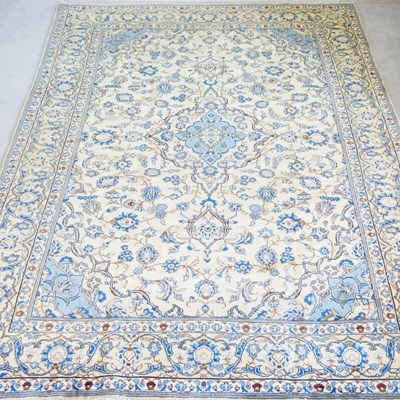 Lot 194 - A Persian kashan carpet, with foliate designs,...