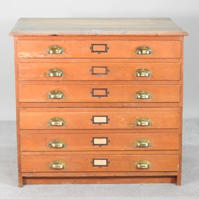 Lot 140 - A mid 20th century plan chest, in two parts,...