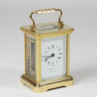 Lot 8 - A small brass cased carriage clock, by Garrard...