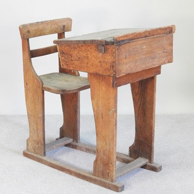 Lot 470 - An antique elm children's desk, 55cm wide
