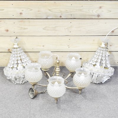 Lot 373 - A pair of chandeliers, together with another...