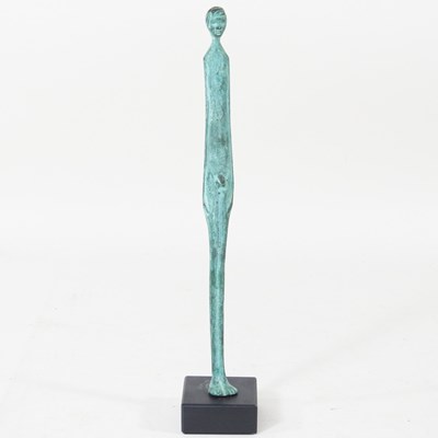 Lot 9 - After Giacometti, a verdigris figure, on a...