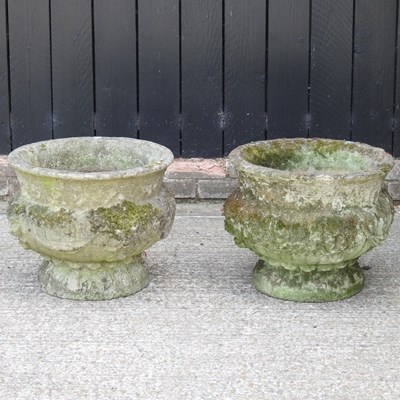 Lot 48 - A pair of cast stone garden planters, 41cm high
