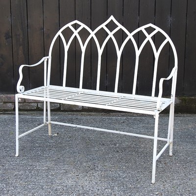 Lot 301 - A white painted metal gothic style garden bench