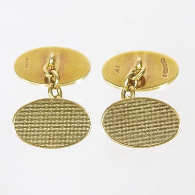 Lot 11 - A pair of 9 carat gold cufflinks, of oval...