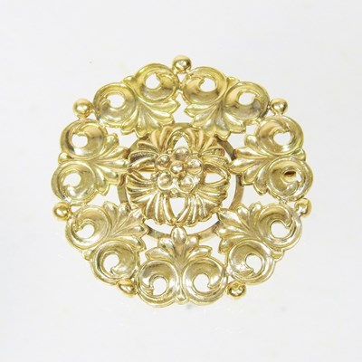Lot 58 - A 9 carat gold brooch, of circular shape, with...