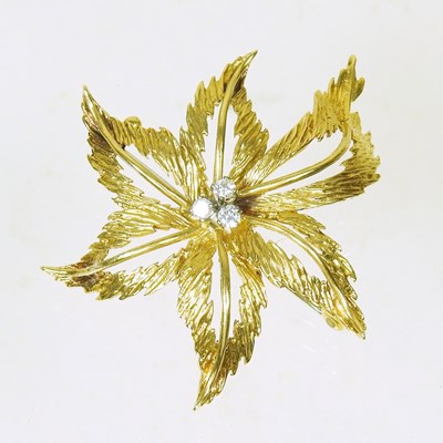 Lot 90 - An 18 carat gold and diamond set brooch, of...