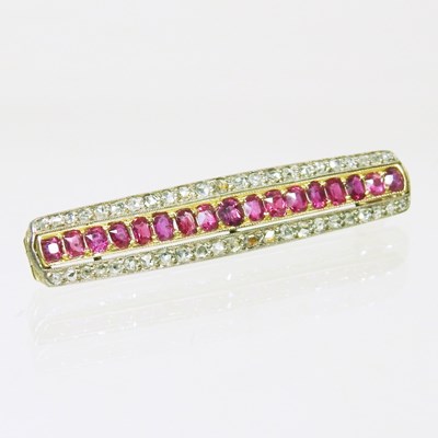 Lot 149 - A ruby and diamond bar brooch, of Art Deco...