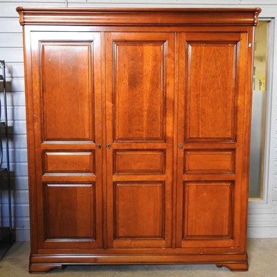 Lot 399 - A modern cherry wood triple wardrobe