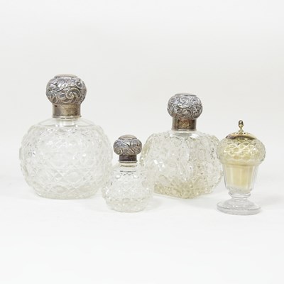 Lot 126 - An Edwardian silver mounted cut glass scent...