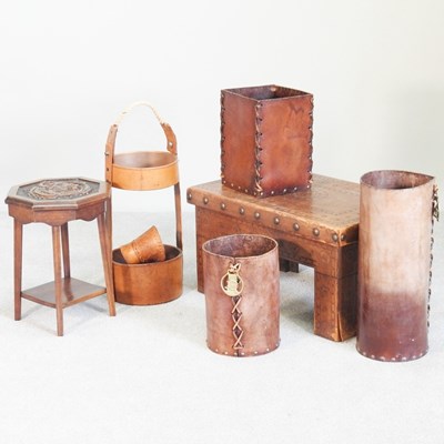 Lot 534 - A brown leather and studded occasional table,...