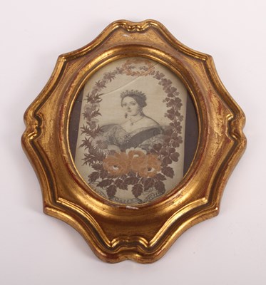 Lot 819 - A framed silk embroidery portrait of Queen...