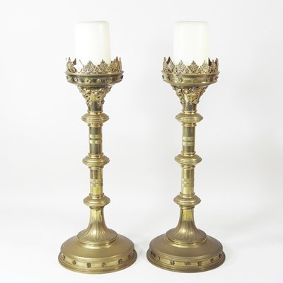 Lot 33 - A pair of large brass altar sticks, each...