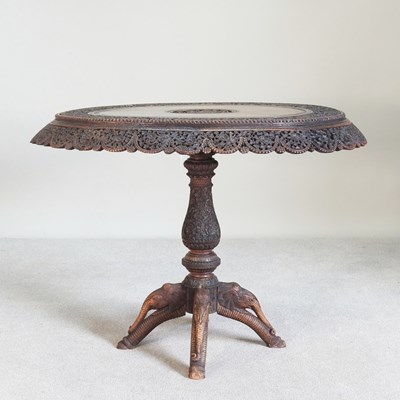 Lot 310 - A 19th century Burmese profusely carved...