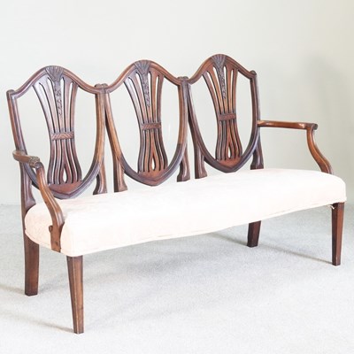 Lot 182 - A George III style triple chairback sofa,...