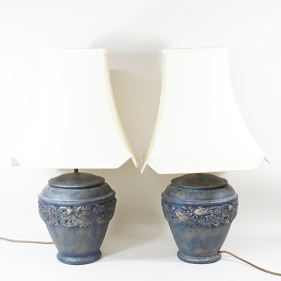 Lot 344 - A pair of blue glazed pottery table lamps and...