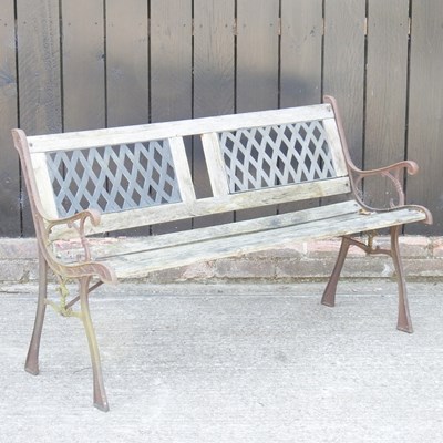 Lot 143 - A wooden garden bench, with metal inserts