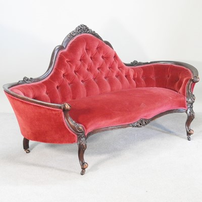 Lot 418 - A Victorian red upholstered double ended couch,...