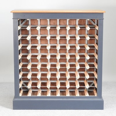 Lot 45 - A hand made light oak and blue painted wine...