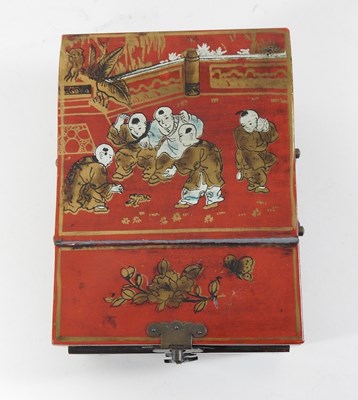 Lot 150 - A Chinese style red lacquered jewellery box