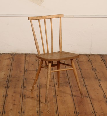 Lot 843 - An Ercol blonde elm stick back dining chair